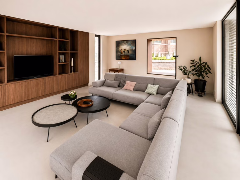 Bio Lavasteen gietvloer Eindhoven kleur Olivera in ruime woonkamer met lichtgrijze U-bank